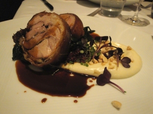 Western Plains suckling pork with cauliflower puree, silverbeet, barberry and almonds