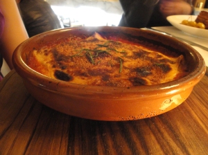 Baked cannelloni with pork and veal ragu, white cheese sauce